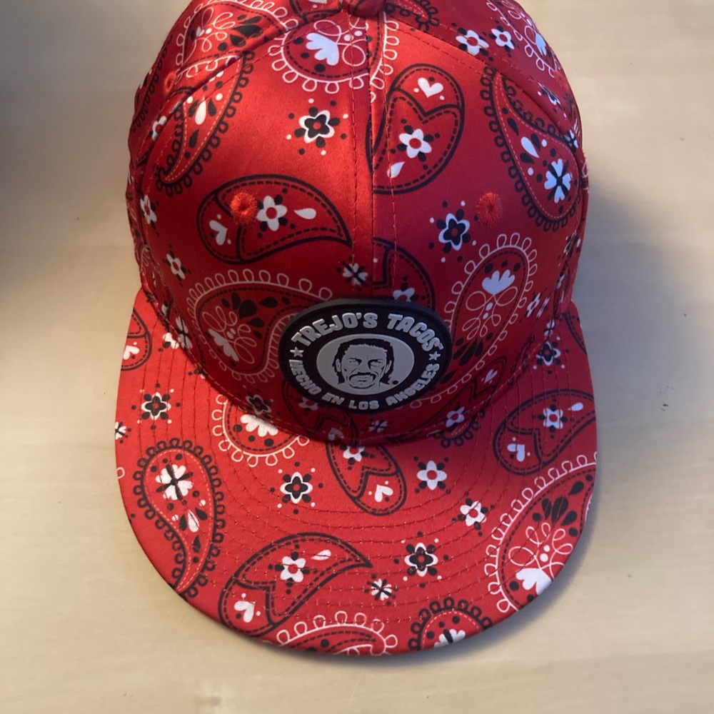 Trejo’s Tacos red satin paisley hat and autographed cookbook